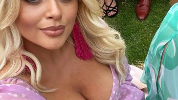 Emily Atack Shows Off Her Cleavage (2 Photos)