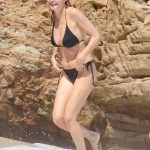 Heather Graham Slips Into a Black Bikini for a Beachside Frolic Next to a Mystery Man (35 Photos)