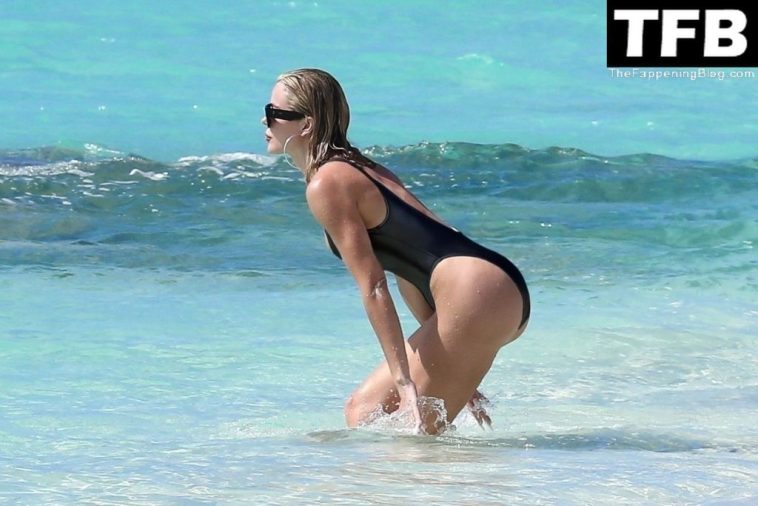 Khloe Kardashian Show Off Her Incredible Figure in a Black Bikini While in Turks and Caicos (11 Photos)