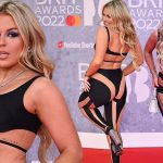 Tallia Storm Flaunts Her Sexy Figure in a Risqué Black Top and Cutout Trousers at The BRIT Awards (18 Photos)